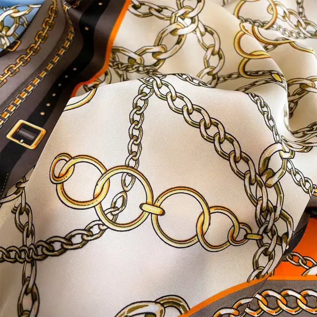 Silk-Feel Scarf – Orange with Chic Chain Print